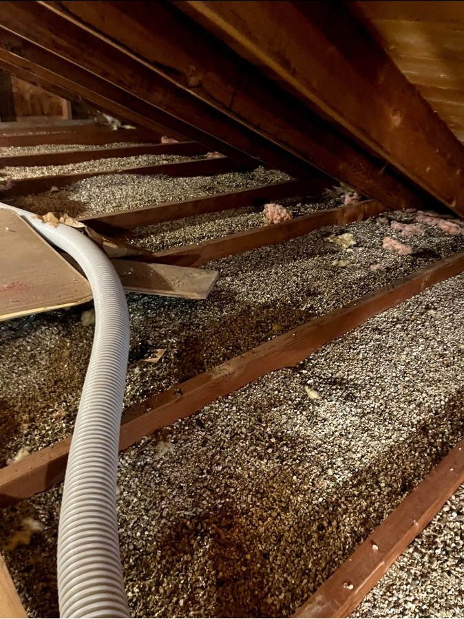 vermiculite insulation removal from residential attic in concord, MA