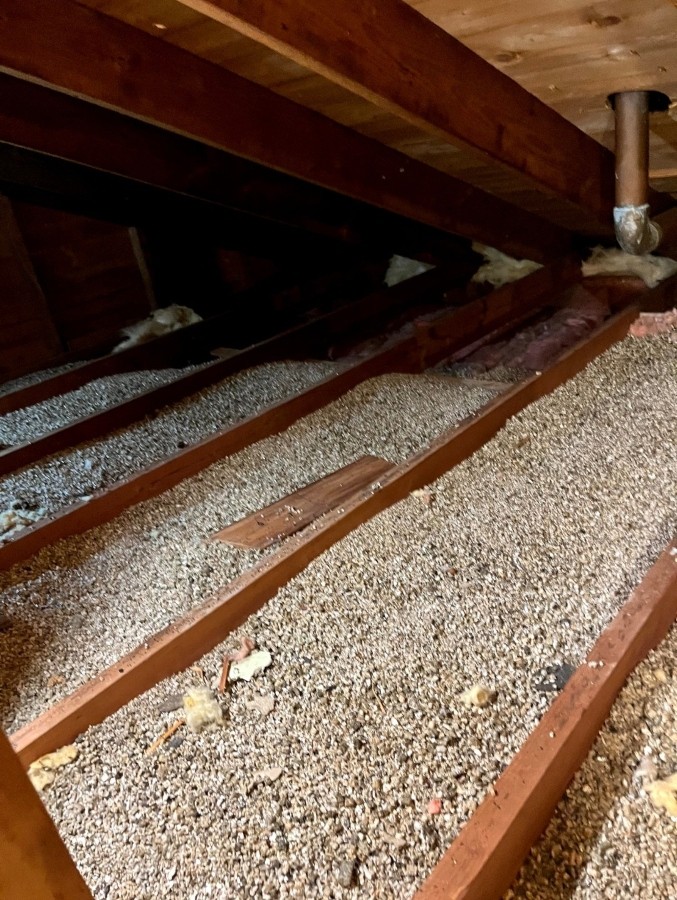 vermiculite insulation removal from residential attic in concord, MA