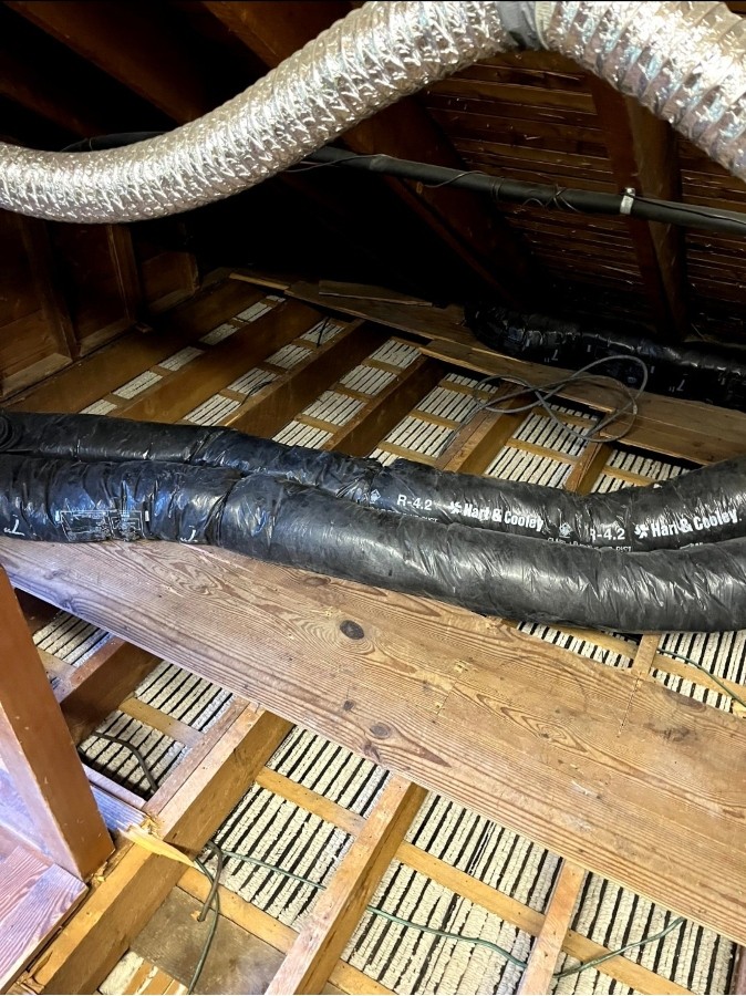 vermiculite insulation removal from residential attic in concord, MA