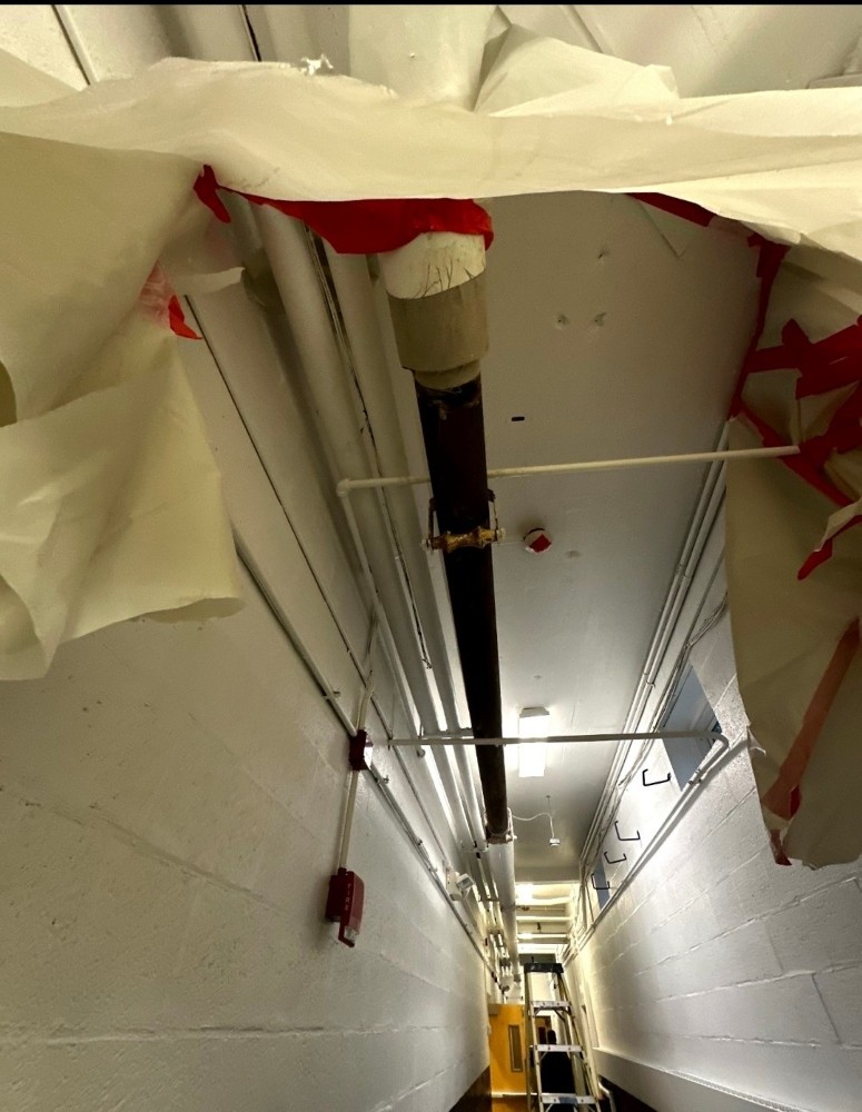 Swift Asbestos Abatement in Cambridge, MA School ACM Leaky Pipe