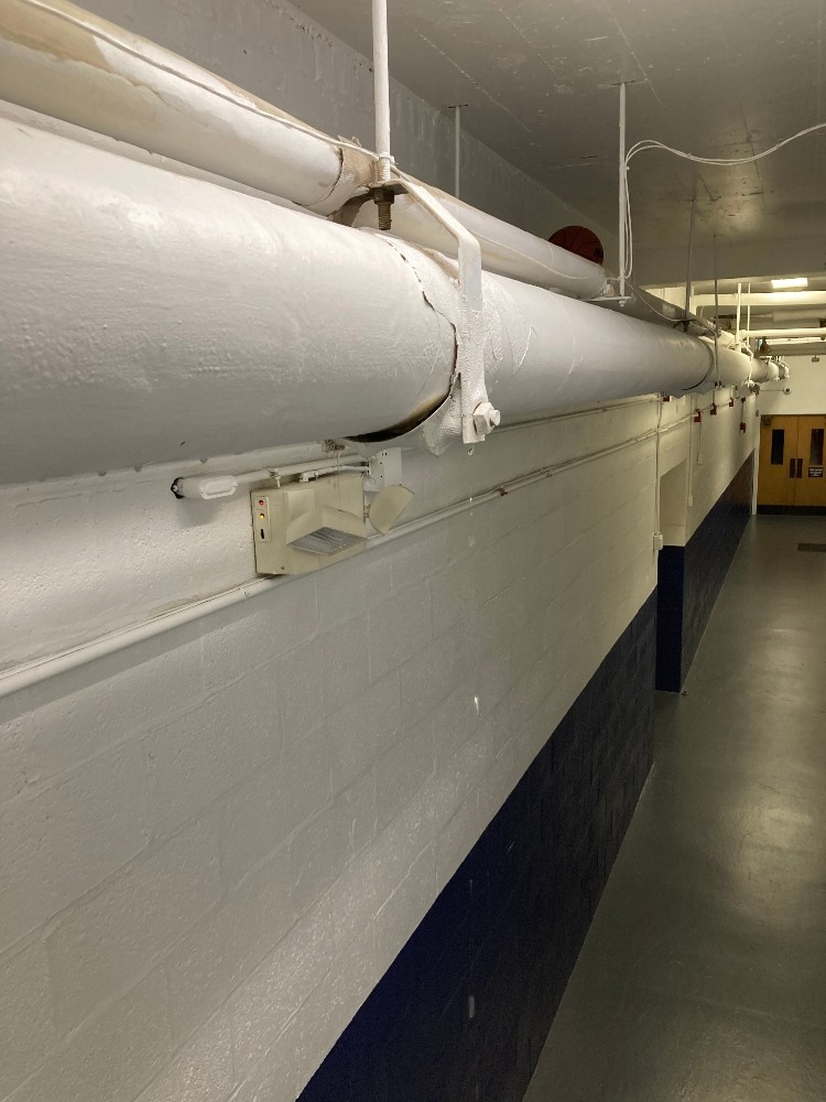 Swift Asbestos Abatement in Cambridge, MA School ACM Leaky Pipe
