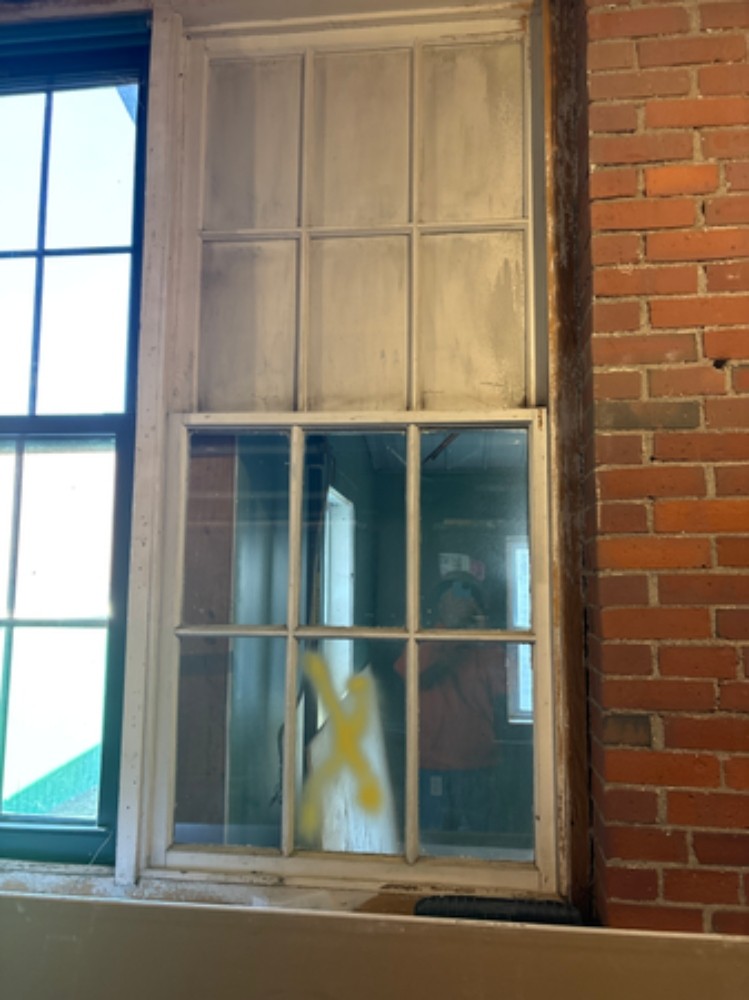 Window Caulking and Glazing Asbestos Abatement at the New Balance Factory Store in Skowhegan, ME