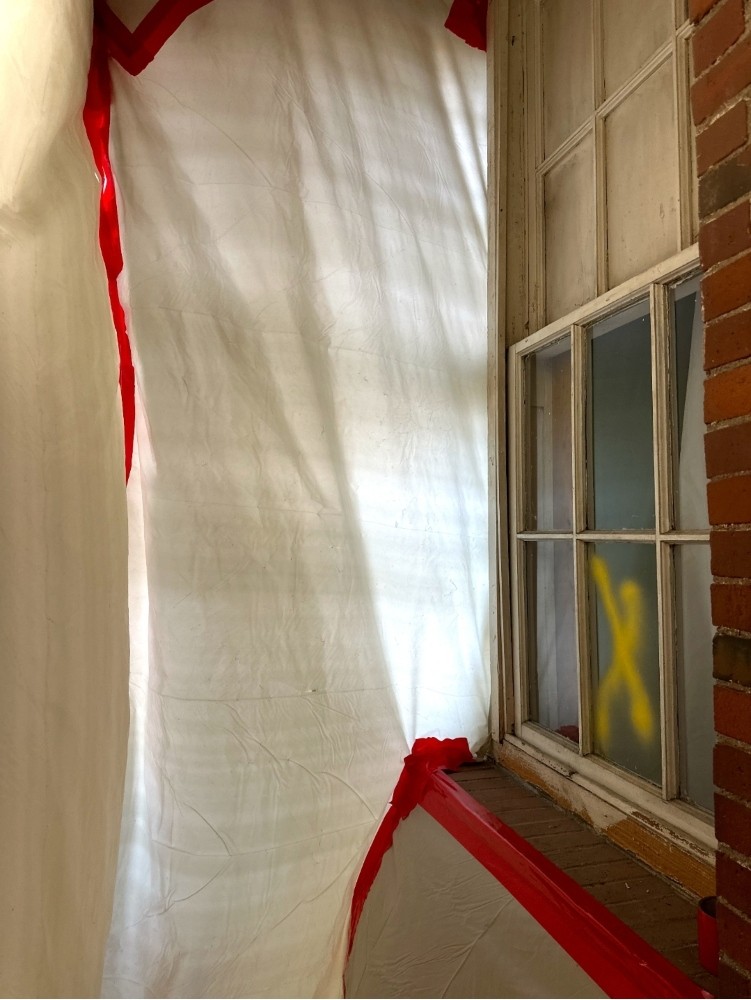 Window Caulking and Glazing Asbestos Abatement at the New Balance Factory Store in Skowhegan, ME